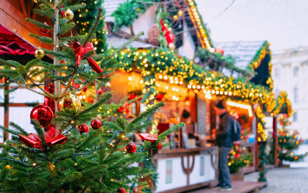Christmas Market at Opernpalais at Mitte in Winter Berlin, Germany. Advent Fair Decoration and Stalls with Crafts Items on the Bazaar. Glass